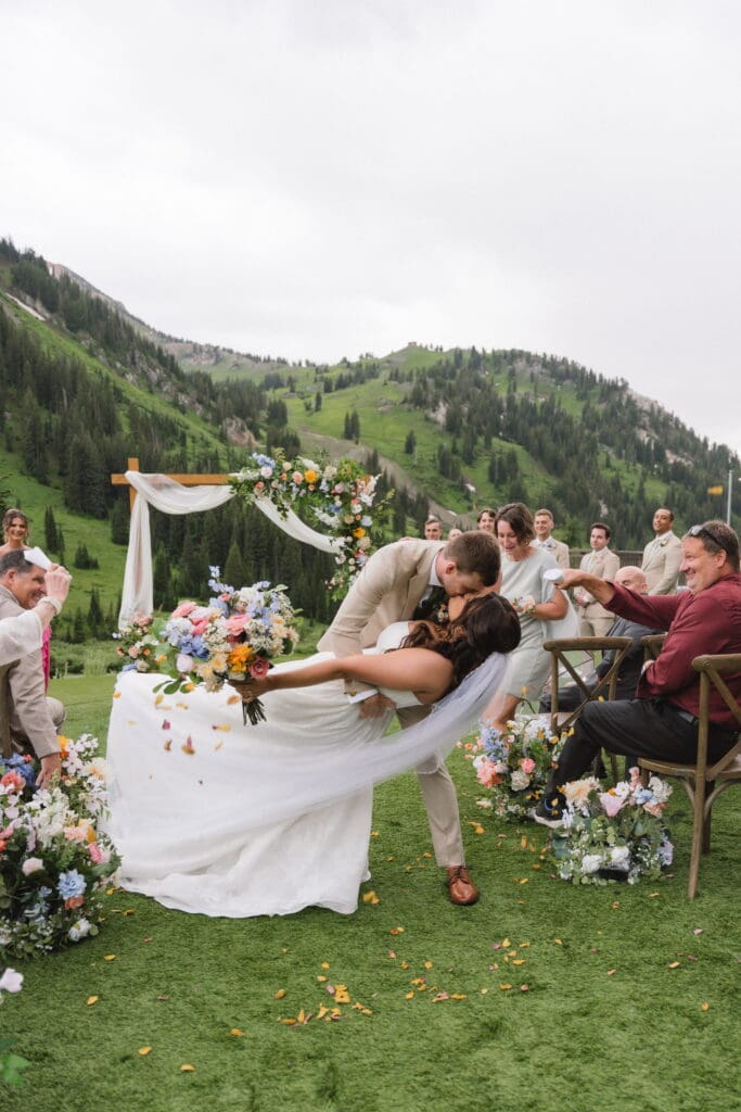 Hailey and Grant celebrating their outdoor wedding ceremony at Snowpine Lodge in Alta