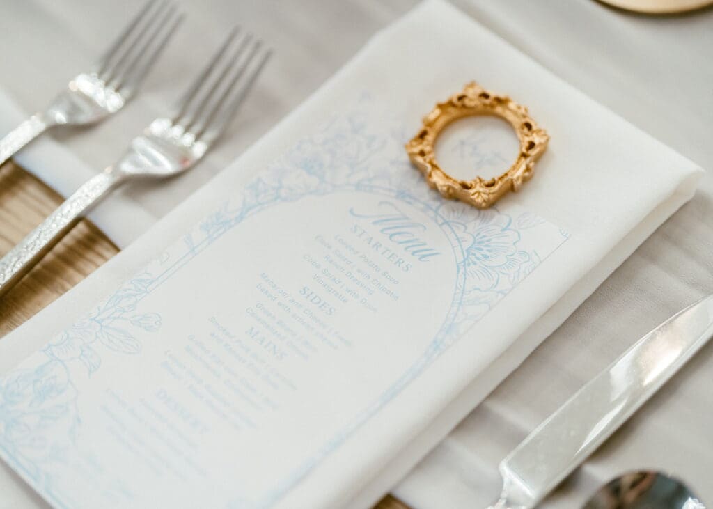 Wedding menu and table details from Hailey and Grant's Snowpine Lodge celebration