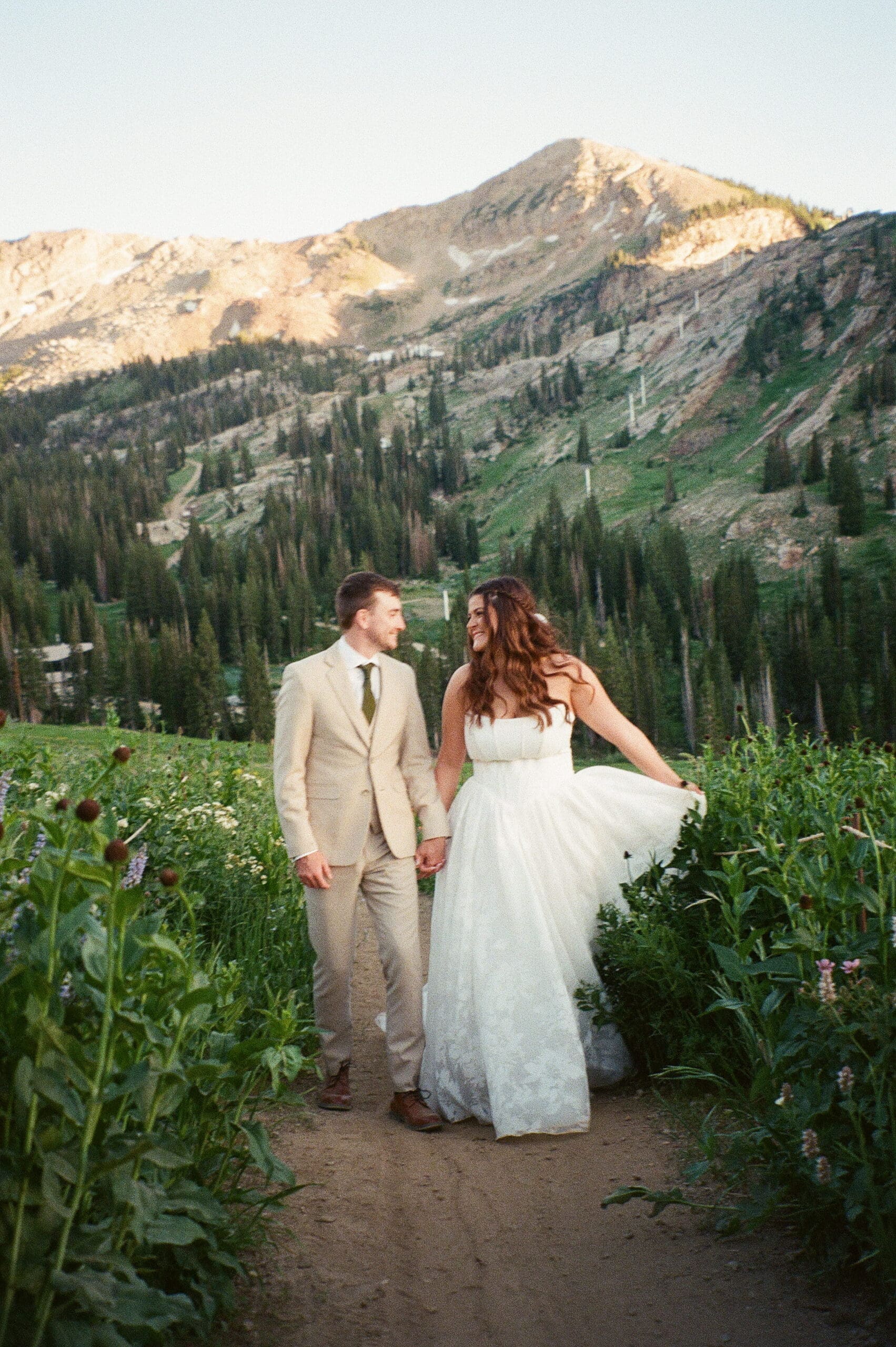 Hailey and Grant surrounded by mountain views at Snowpine Lodge in Alta, Utah