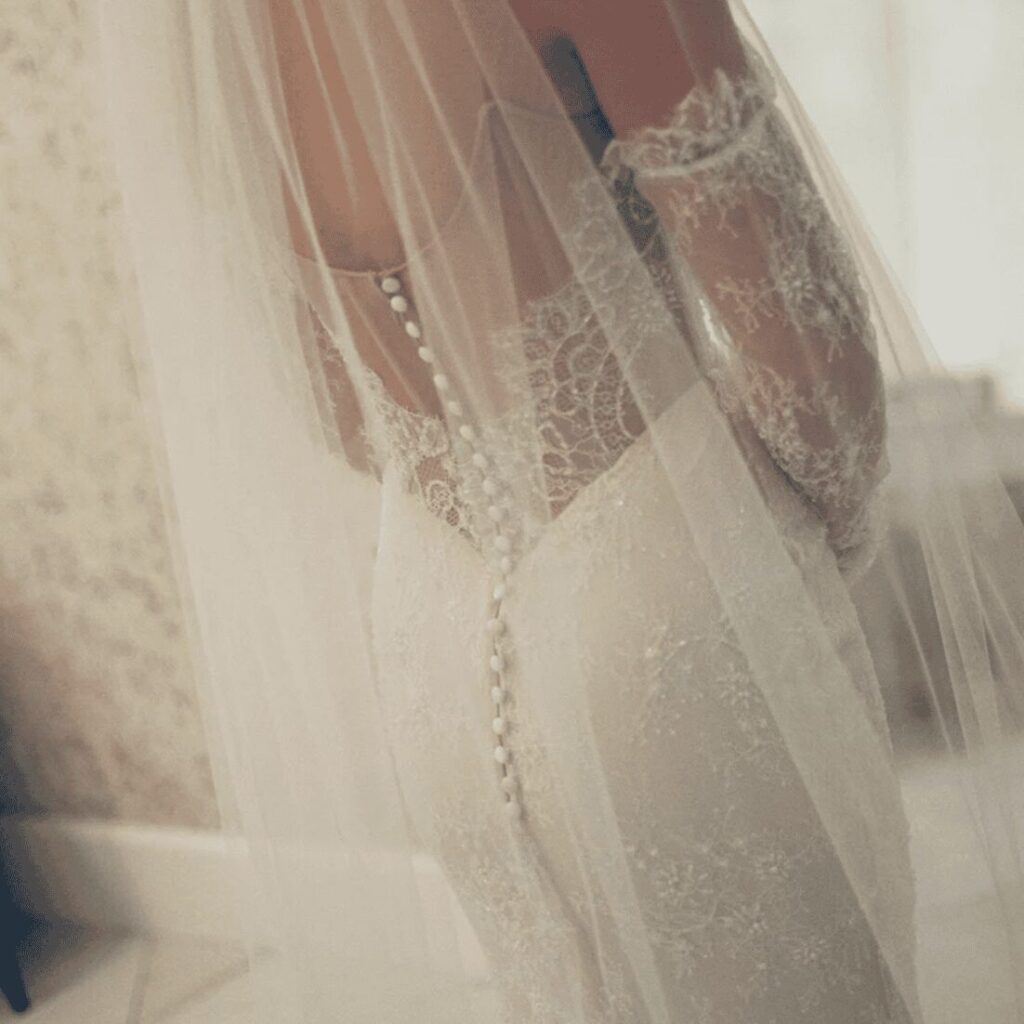 Wedding dress detail from Hope and Paytin's wedding at Siempre in Draper, Utah